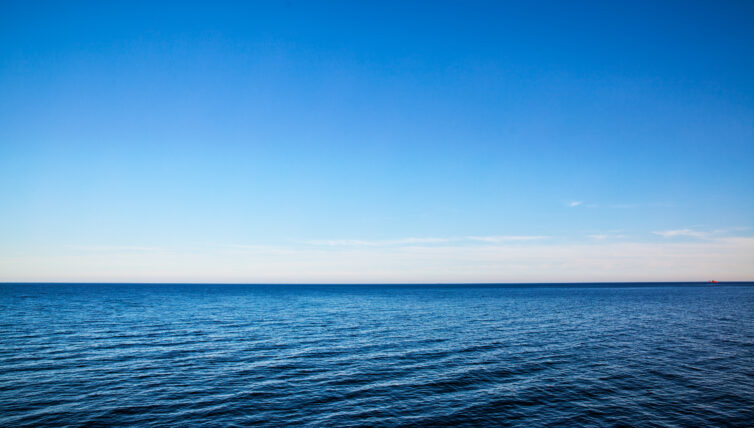 Horizon with blue sea and bright sky